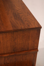 Interior depth view lower drawer showing solid oak paneling