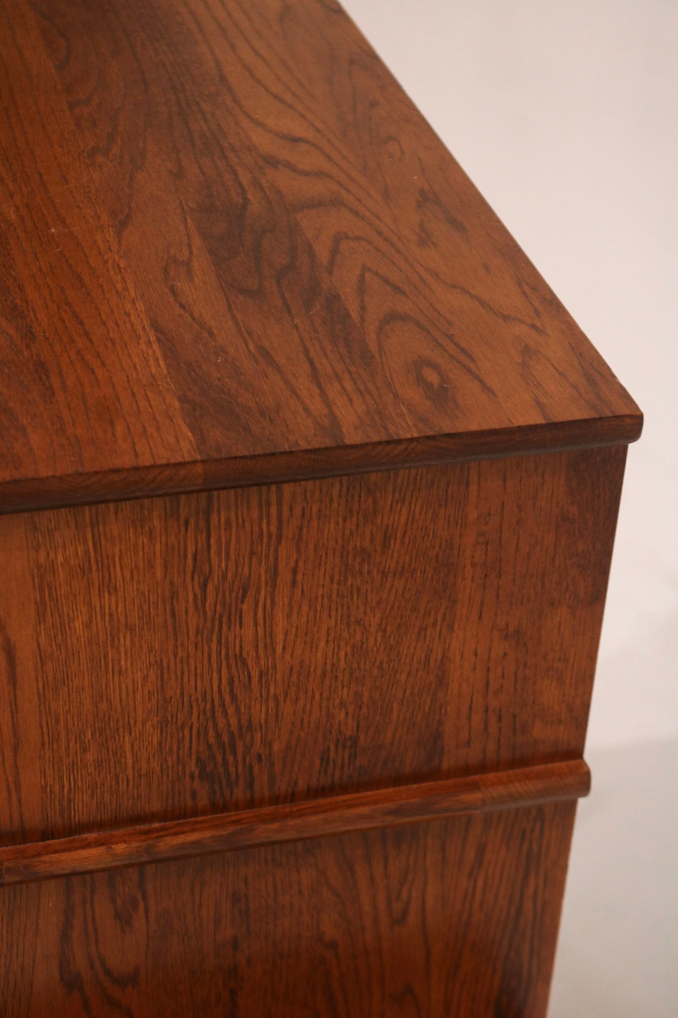 Interior depth view lower drawer showing solid oak paneling