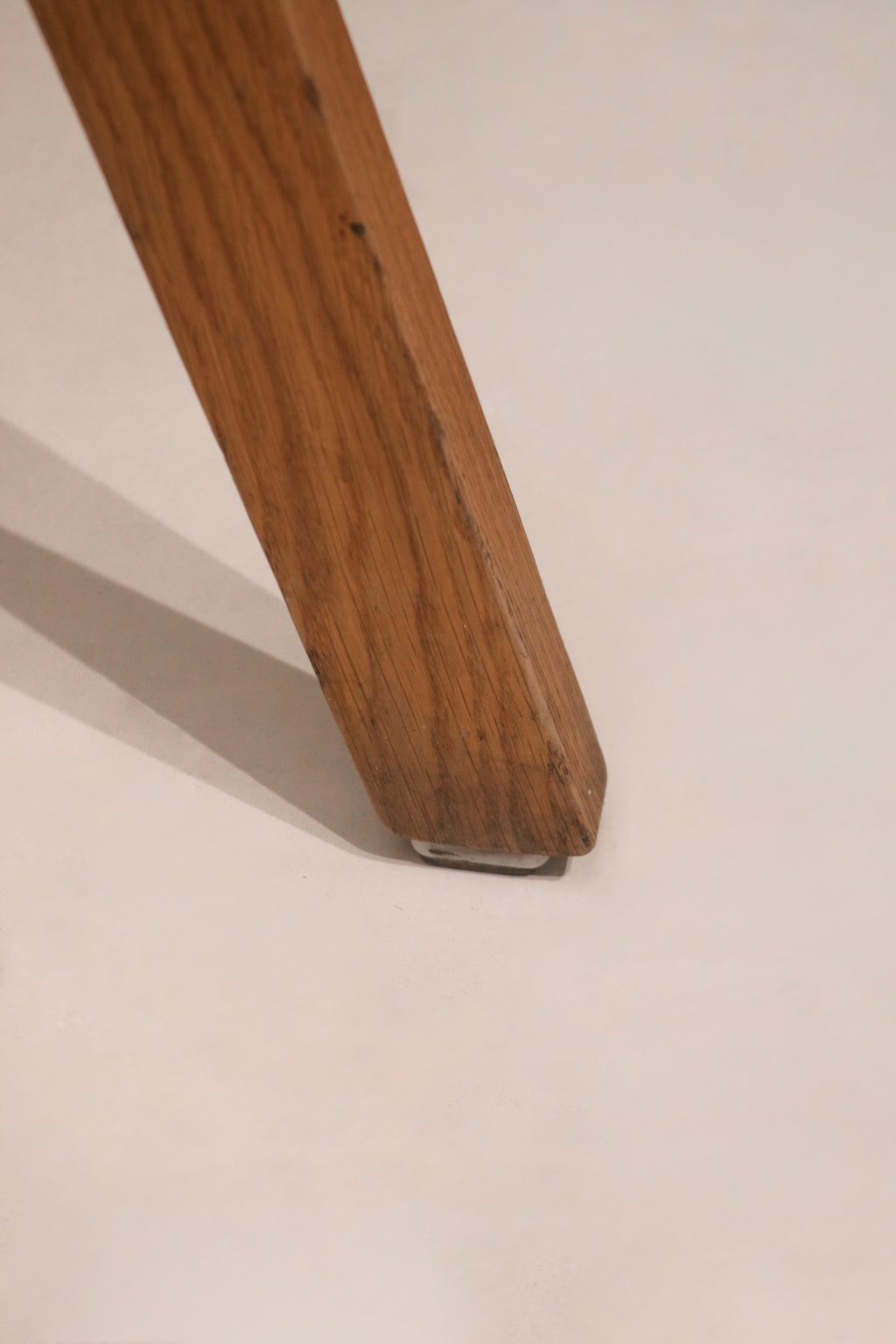 Lower angle profile of legs showing stability and flooring compatibility