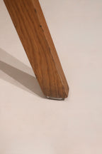Lower angle profile of legs showing stability and flooring compatibility