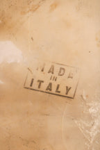Made in Italy stamp on marble underside confirming authenticity