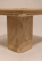 Front view marble base showing geometric faceted design elements