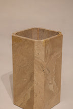Interior view of marble pedestal base showing hollow geometric construction