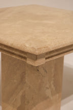 Corner and edge detail of marble table top showing layered construction