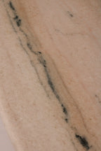 Close-up of white marble top veining pattern and condition