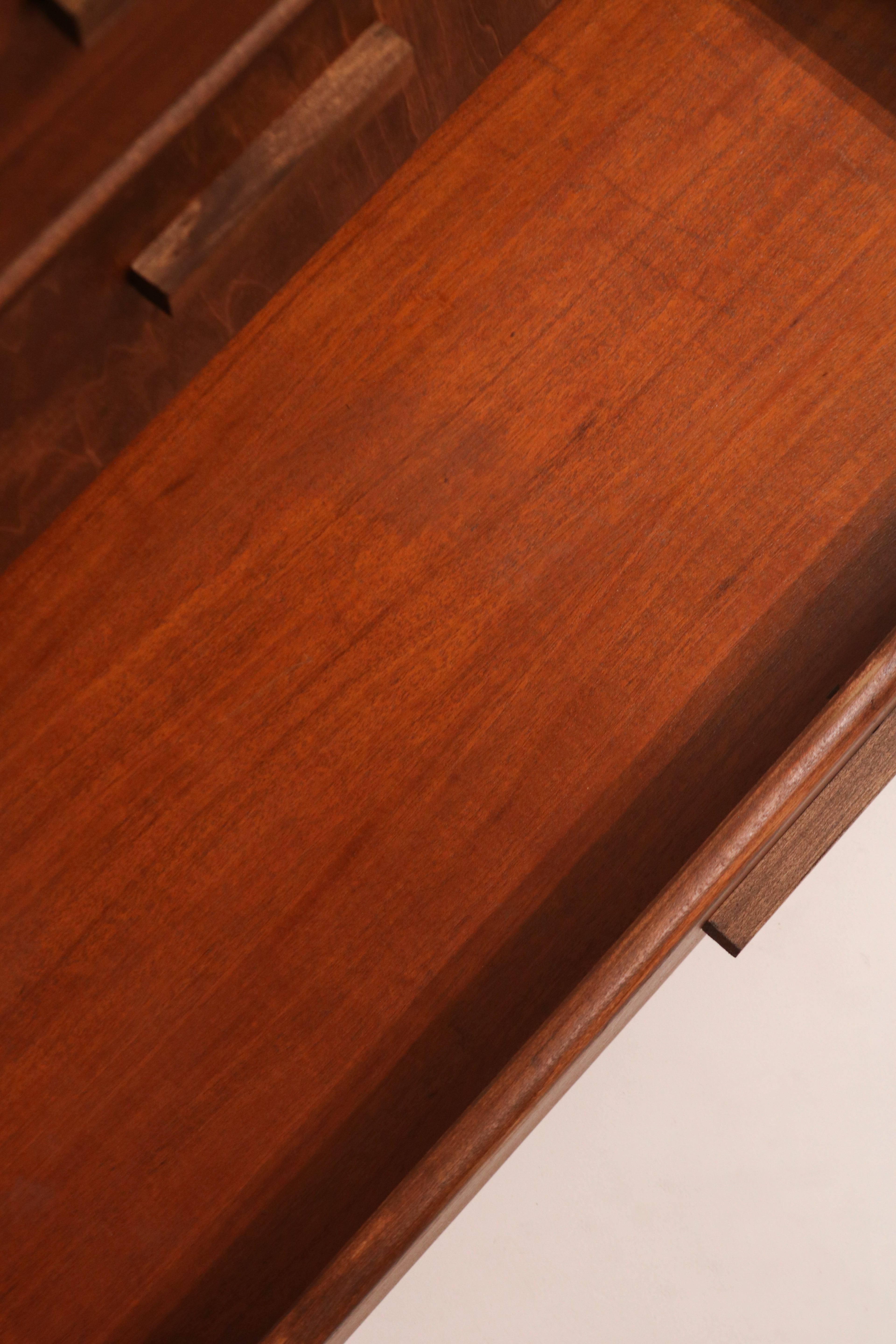 Detail of matched grain veneer pattern across the drawer fronts