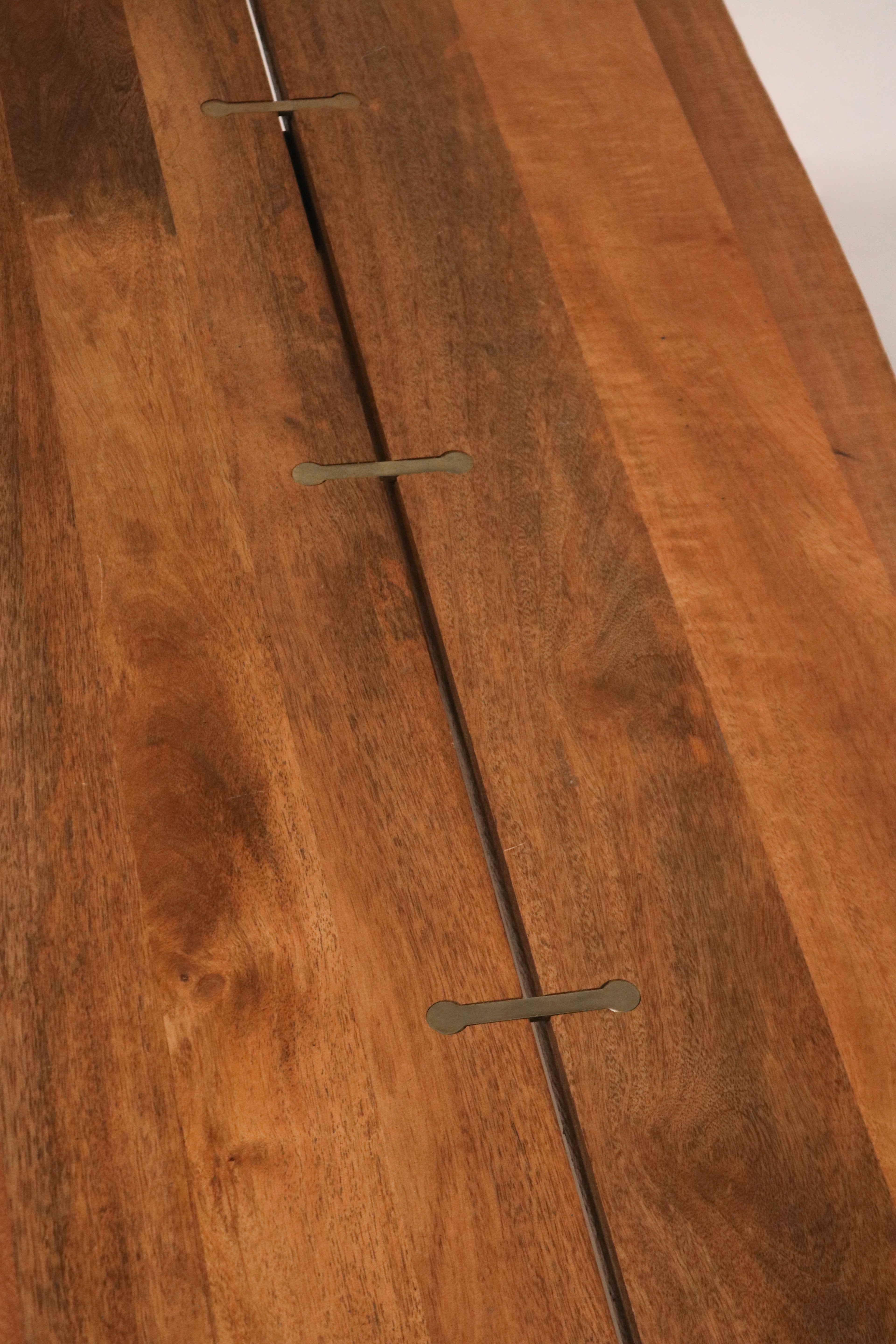 Close-up of natural wood split stabilized with butterfly joint detail