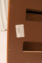 Rear view of both nightstands showing finished back panels and cutouts