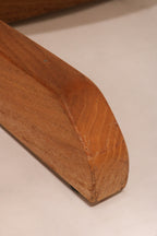 Semi-curved base leg detail showing solid oak mid-century craftsmanship