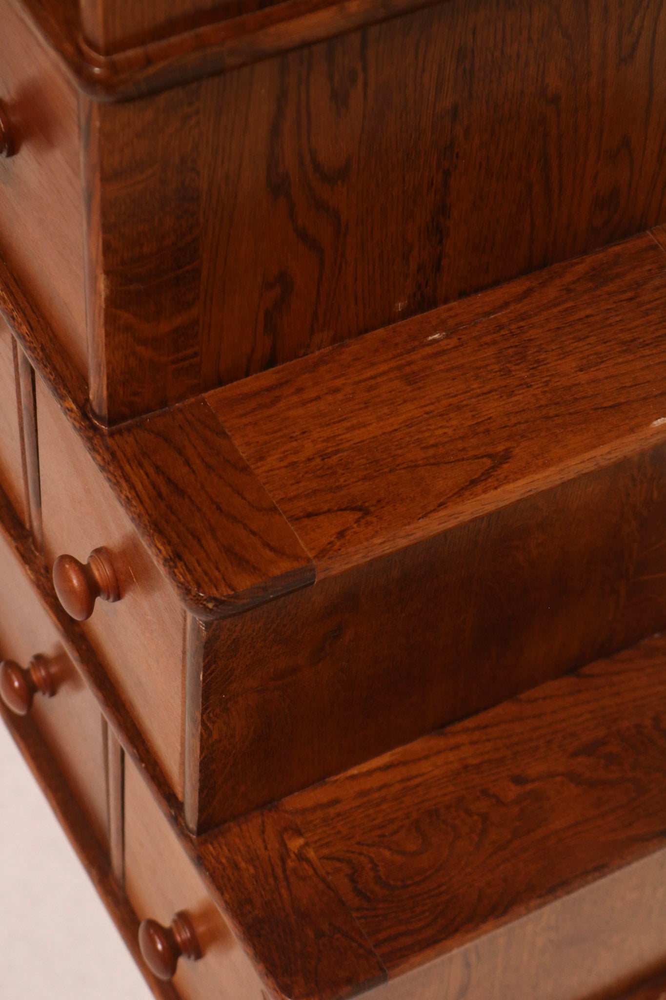 Side panel showing oak wood grain and rustic texture finish