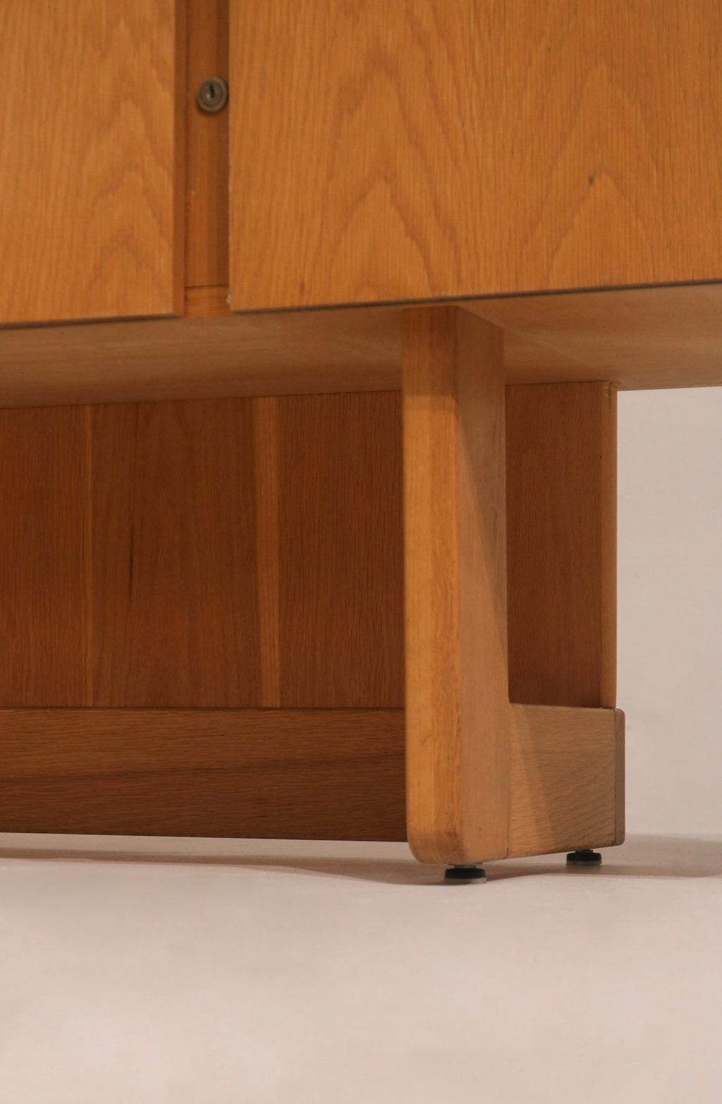 Right side profile view vintage oak credenza showing depth and solid wood construction