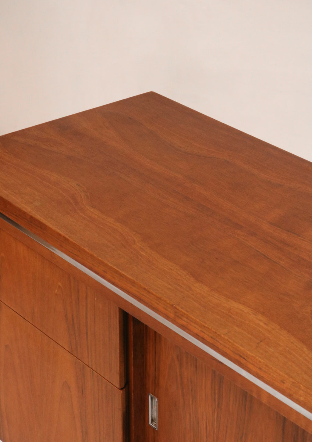 View of open drawer showing original black interior lining