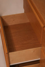 Open drawer view showing clean plywood interior construction