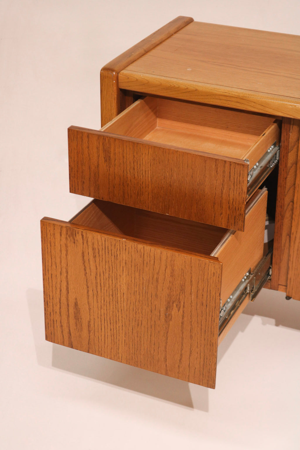 View of open drawers showing storage capacity and smooth glides