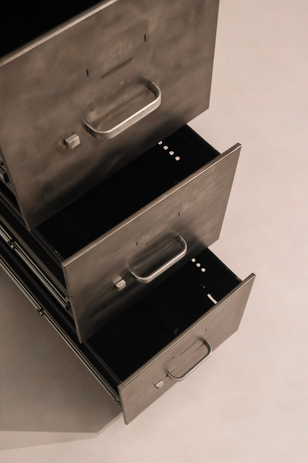 Top-down view of open drawers showing vertical storage capacity