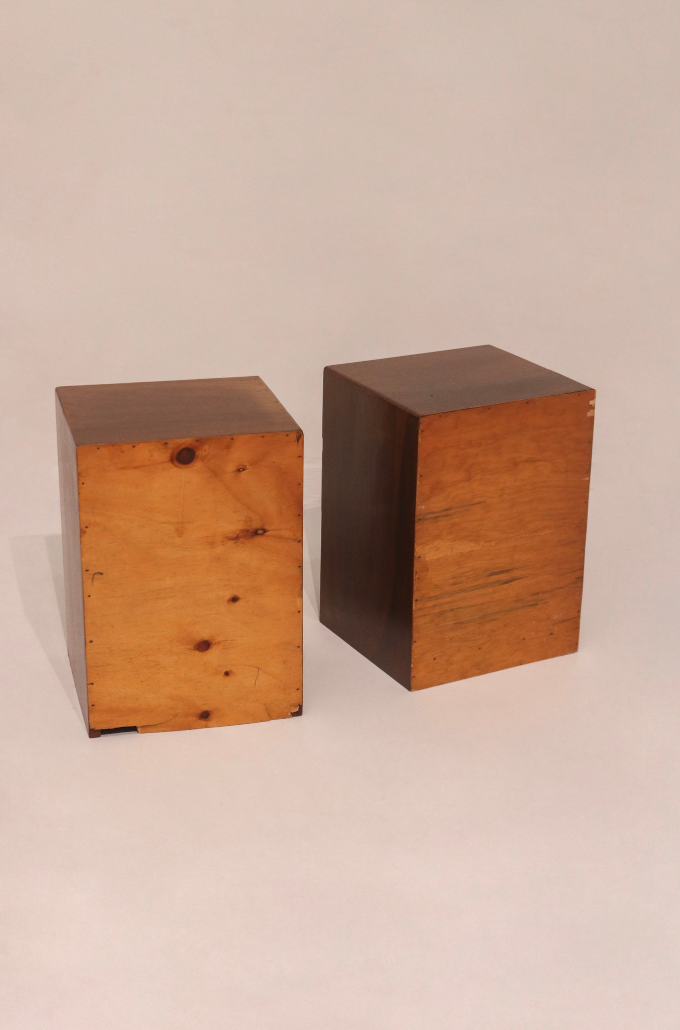 Rear view of both nightstands showing matching condition and wood grain