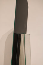Left angle view rare standing mirror with geometric mirrored panel construction