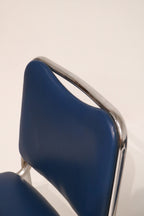 Rear view showing how the leather wraps around the backrest frame