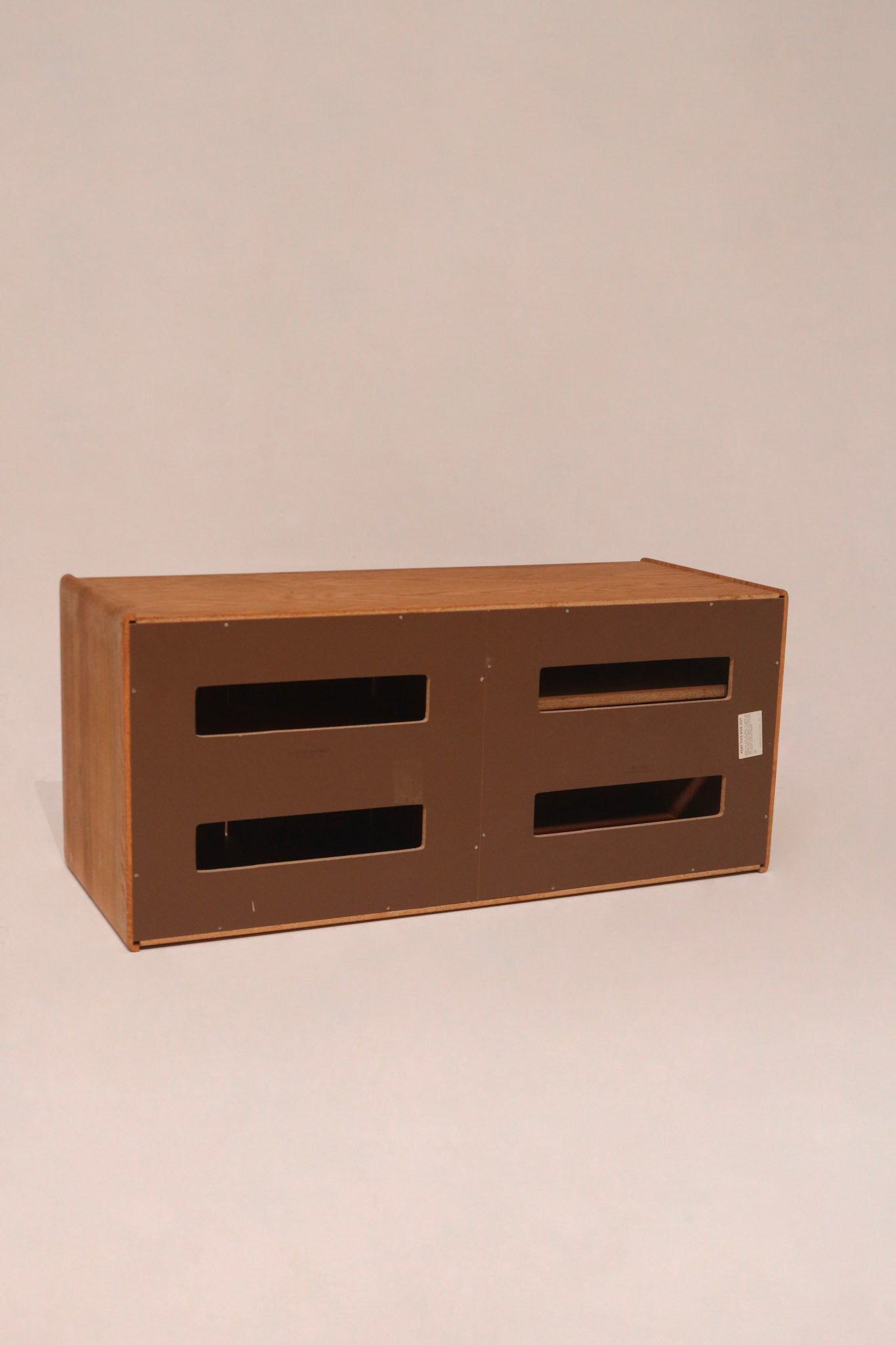 Rear view showing ventilation cutouts and back panel construction