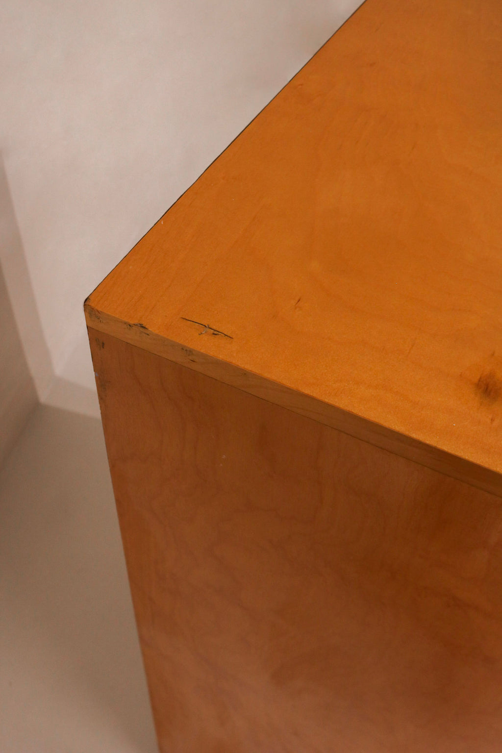 Rear view of the dresser showing particle board back panel construction