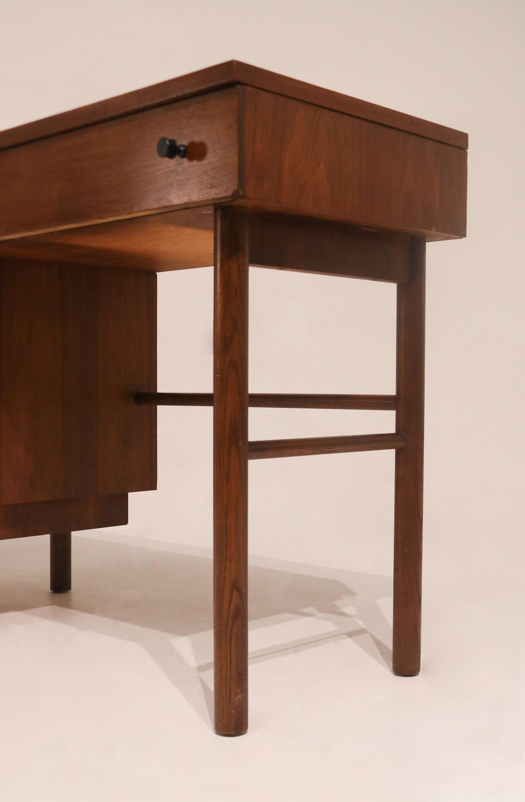 Rear view of desk showing finished back panel allowing floating placement