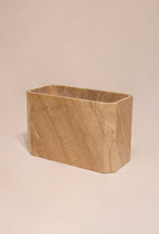 View of the heavy rectangular pedestal base supporting the slab top