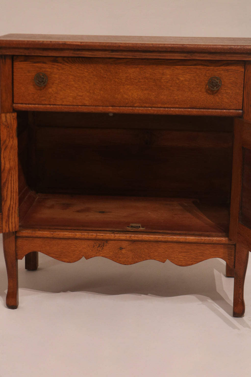 Right angle view showing the cabinet's stance and leg detail