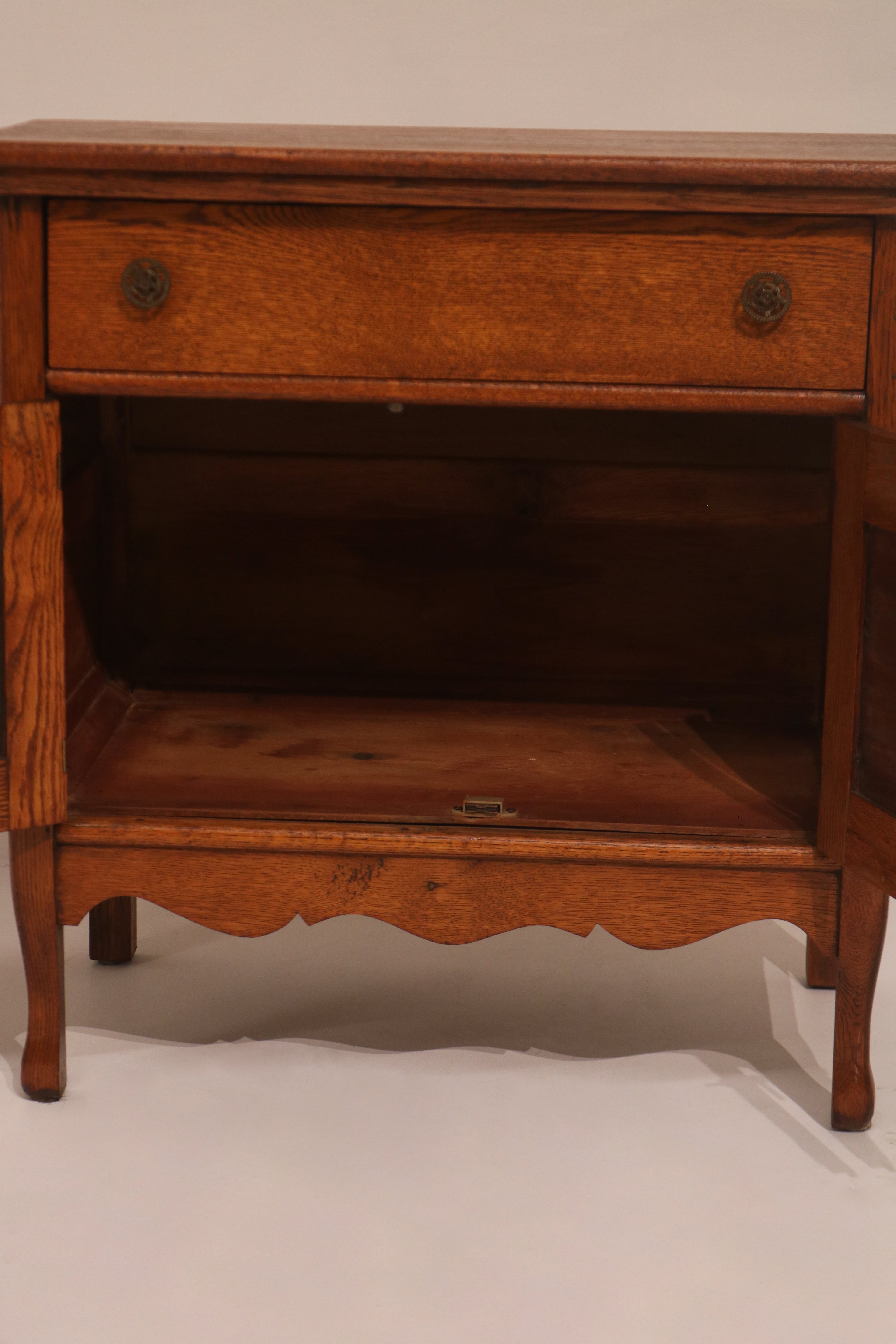 Right angle view showing the cabinet's stance and leg detail