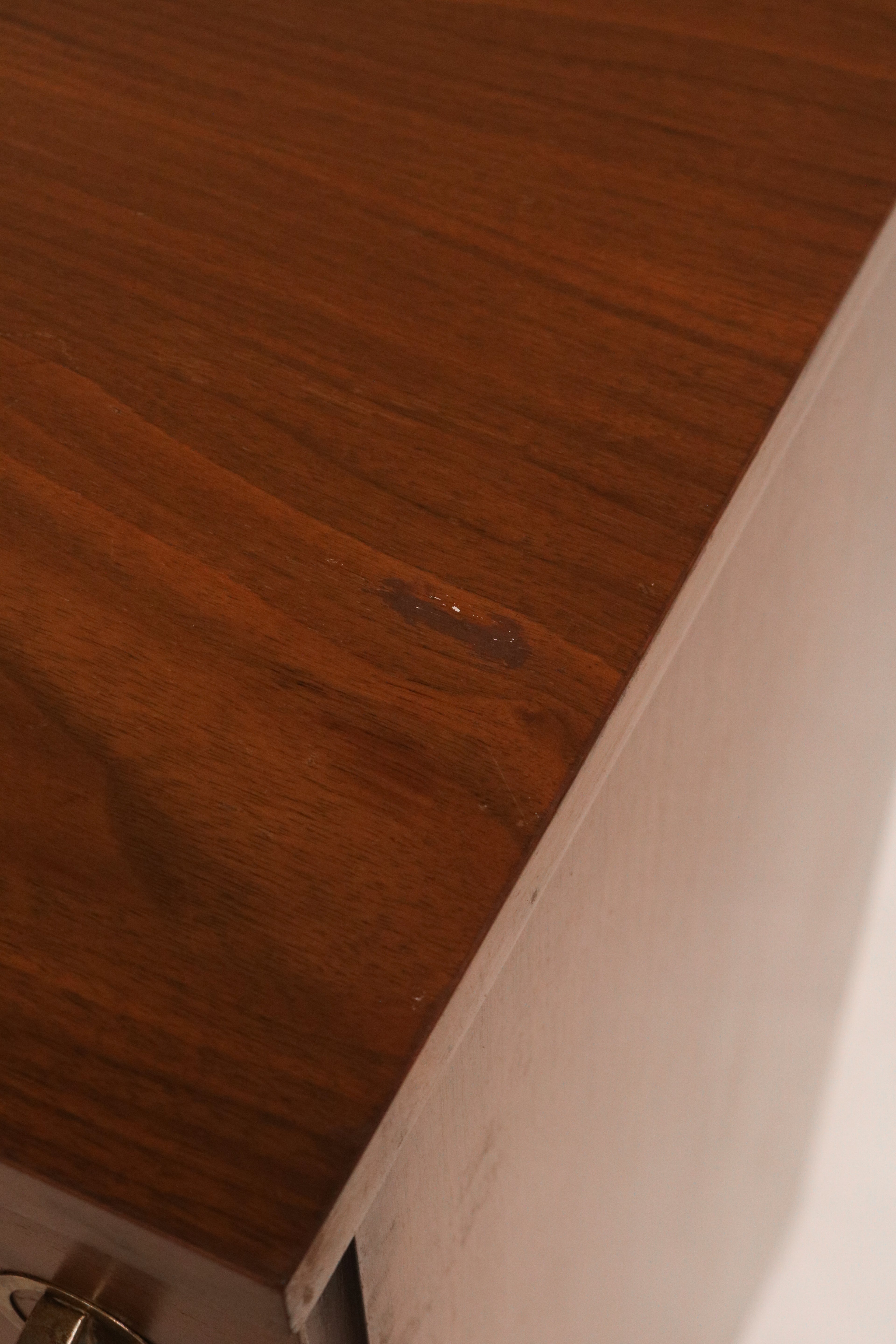 Right angle view showing the tall dresser's stance and proportions