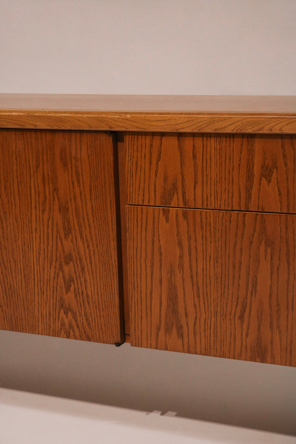 View of the right side cabinet doors and oak finish