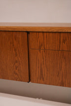 View of the right side cabinet doors and oak finish