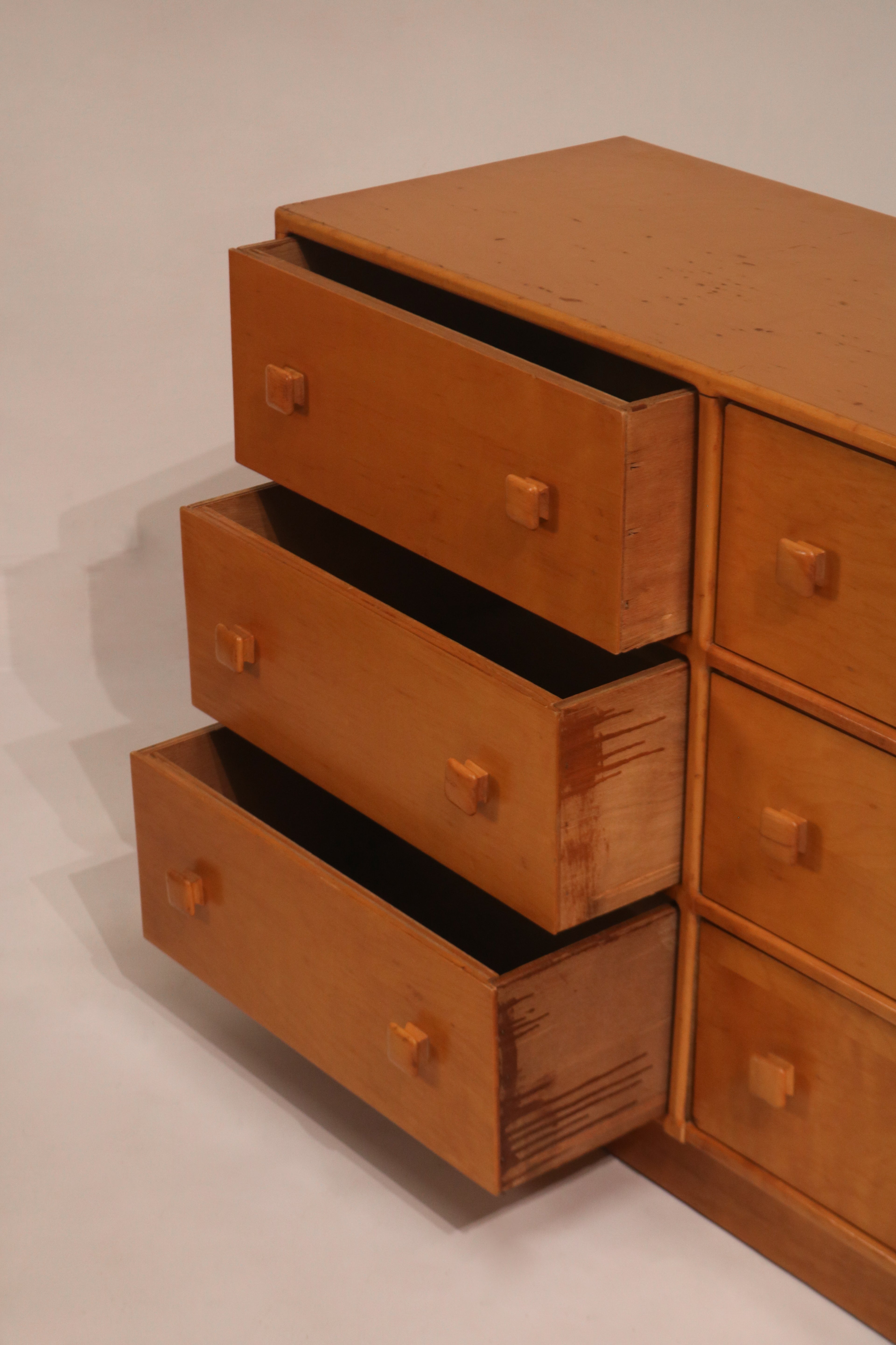 Right side view with drawers open showing slide mechanism and wood edge