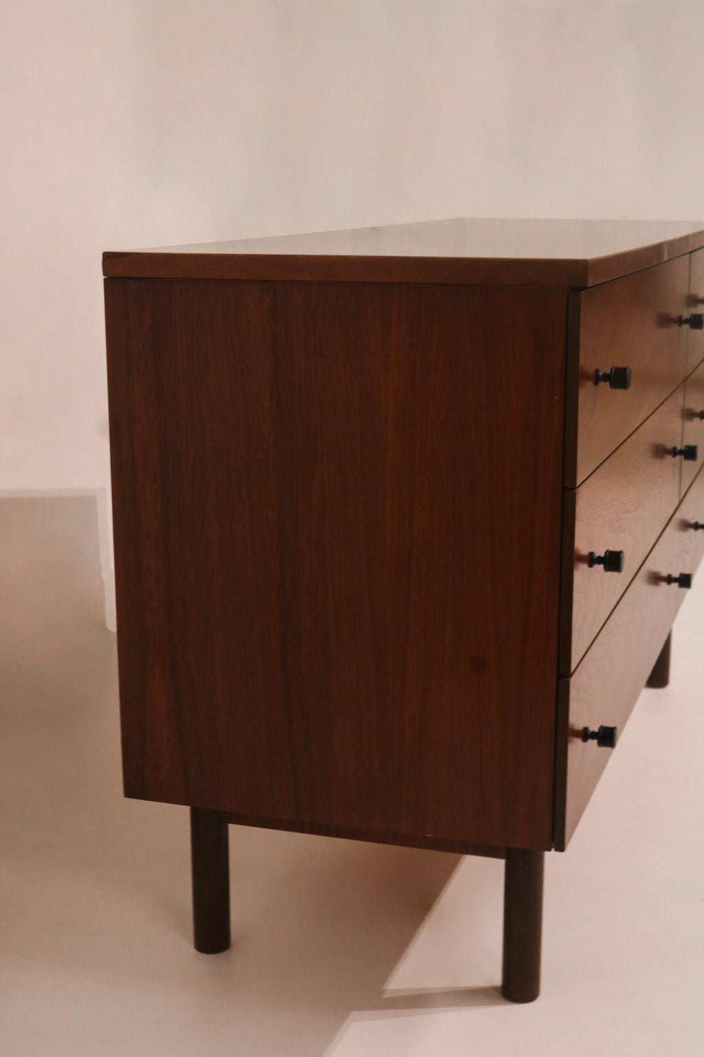 Right side panel view showing vertical walnut grain pattern