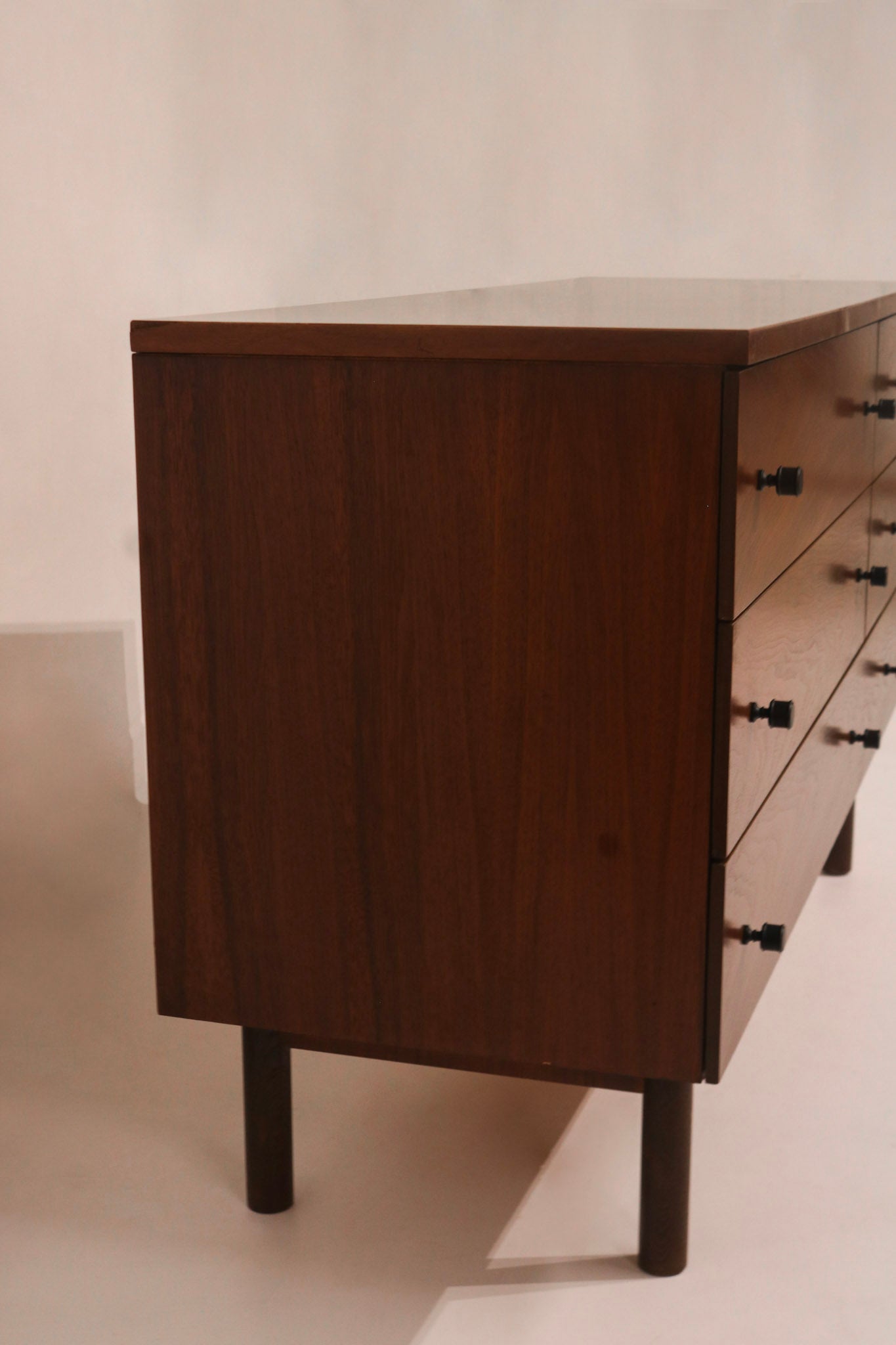 Right side panel view showing vertical walnut grain pattern