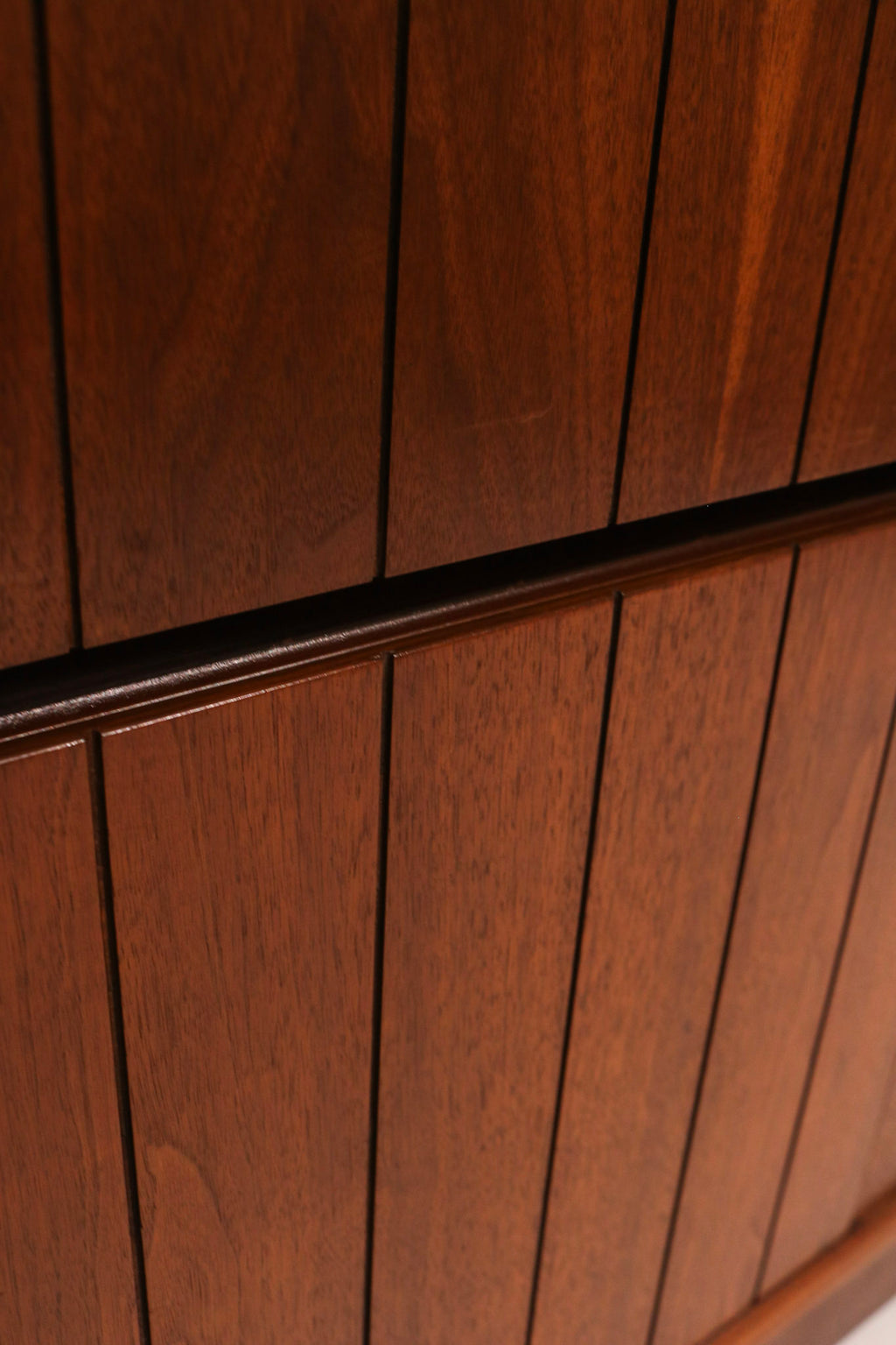 Right side panel view showing walnut veneer condition and grain