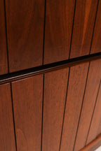 Right side panel view showing walnut veneer condition and grain