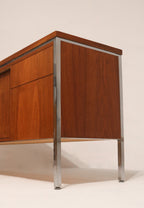 Right side profile view highlighting the external chrome leg structure