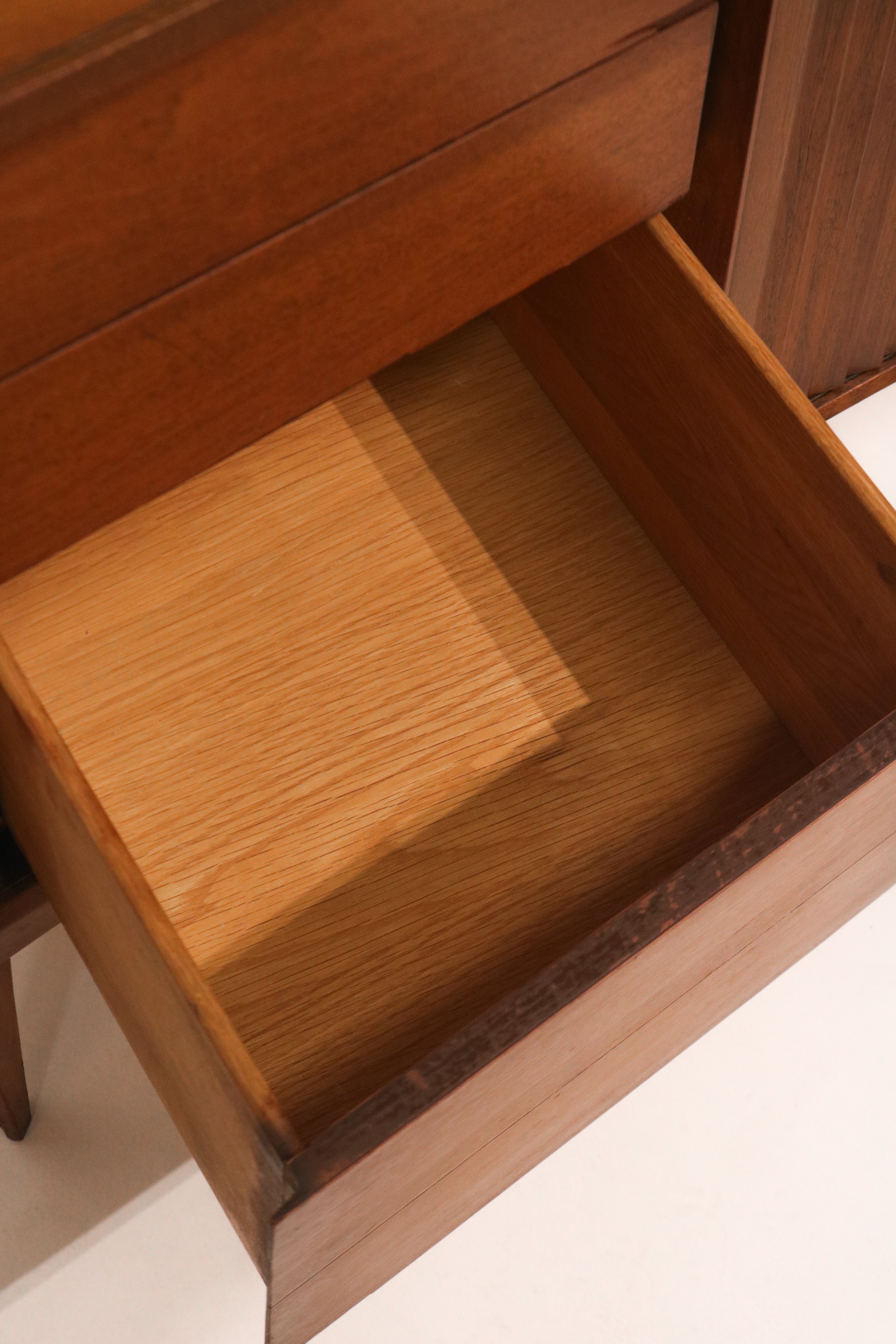 Right side profile view showing walnut finish and leg structure