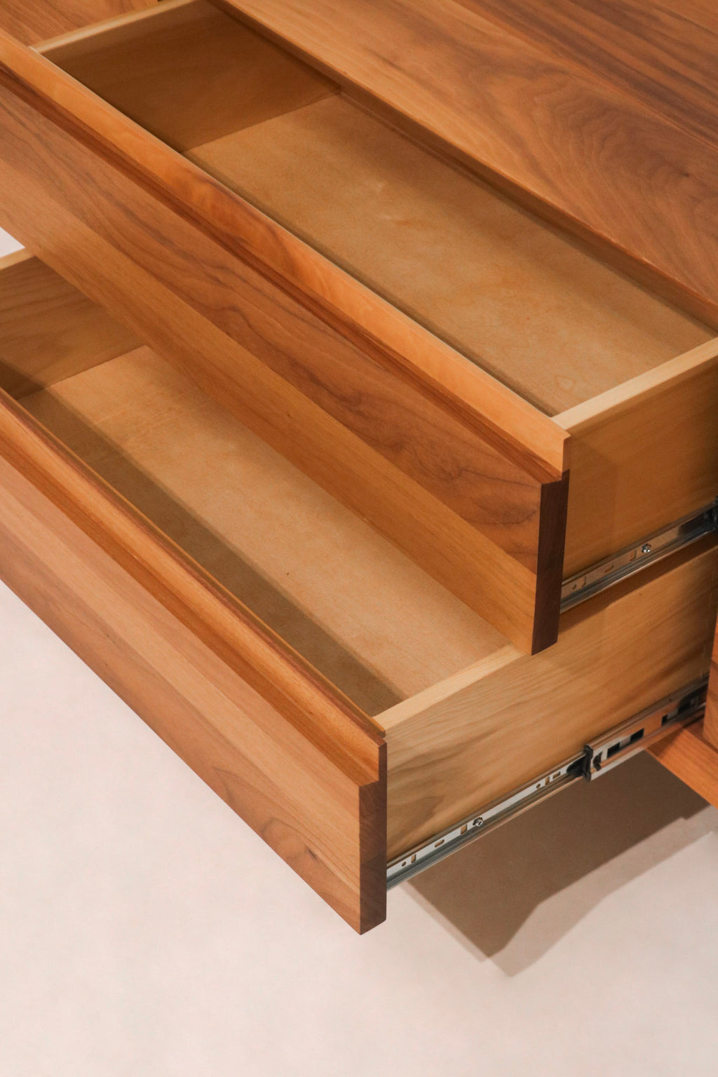 Right side profile view highlighting the rich walnut finish