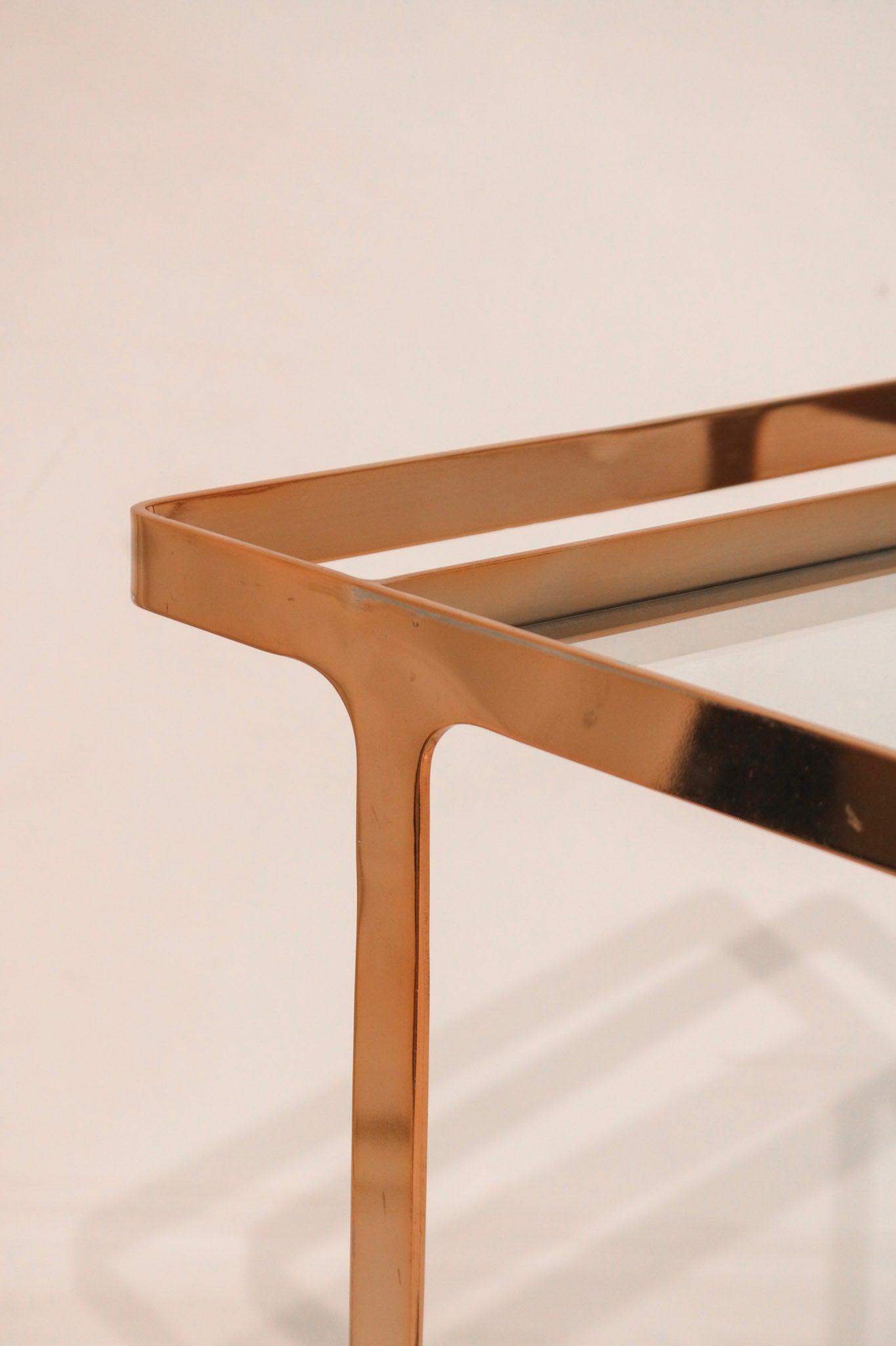 Close-up of rose gold frame corner showing sleek modern finish