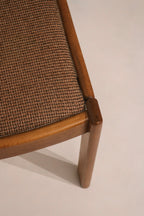 Detail of fabric seat corner connection to solid oak leg