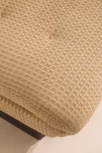 Seat corner upholstery detail showing fabric condition and minor wear