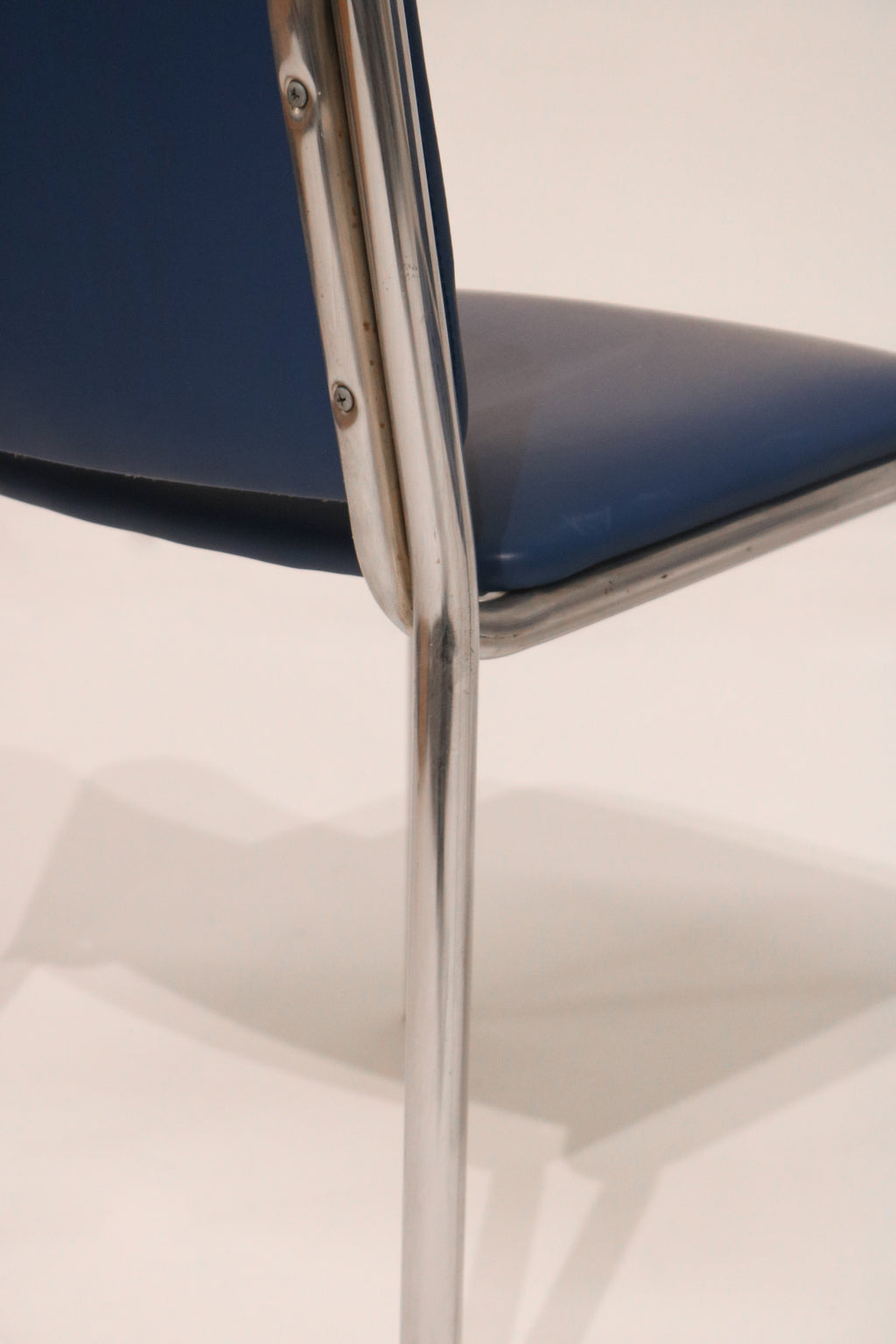 View of the seat cushion showing padding and leather quality