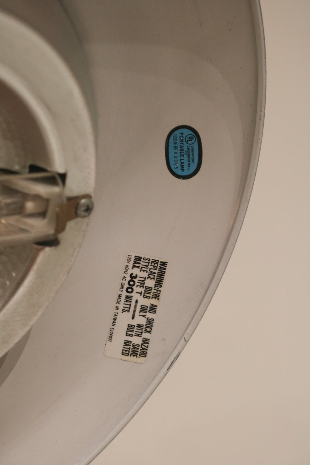 Close-up of vintage label or sticker inside the lamp shade