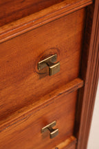 Angled detail view of the side panel wood texture and finish quality