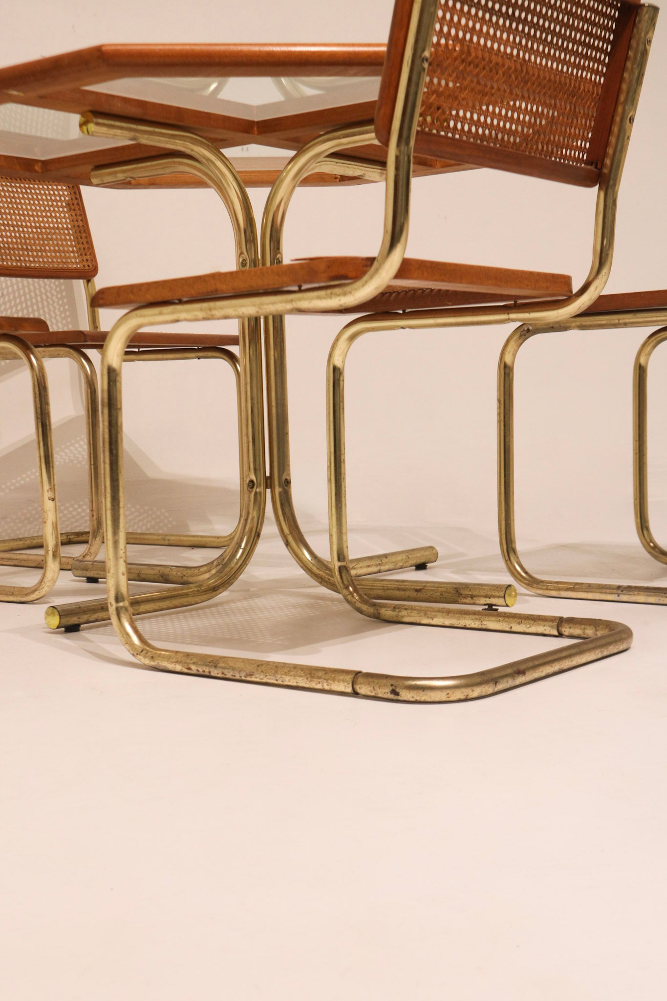 Side angle view of dining set configuration and style compatibility