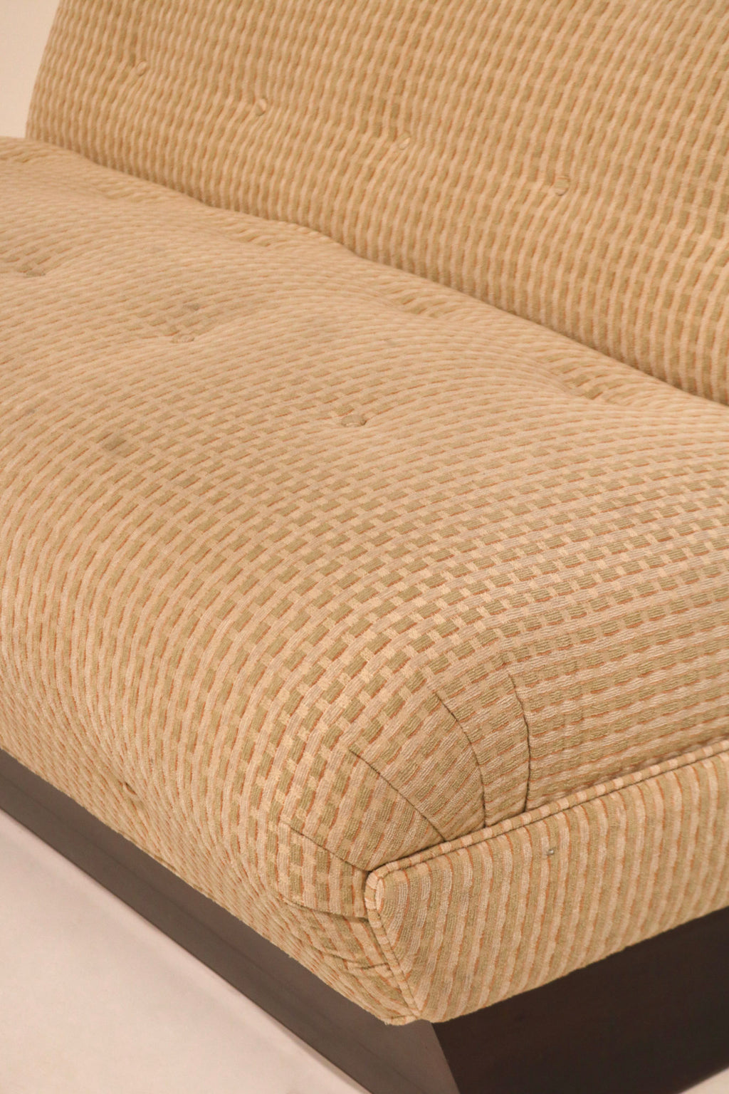 Side angle view showing vintage sofa design and solid base stability