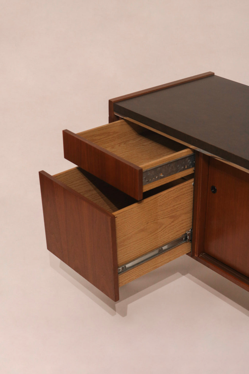 Side drawers open showing storage capacity and construction details