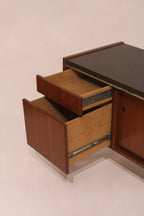 Side drawers open showing storage capacity and construction details