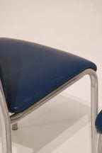Side profile view demonstrating the chair's posture and lines
